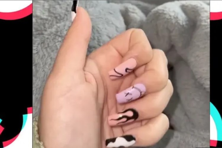 TikTokers Lily Natty Showing Her New Nails Gives a Brief Glimpse Of Her Private Part